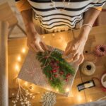 Small business owner planning holiday marketing content for Meta's four phases of holiday shopping.