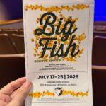 Attending Big Fish performing on stage during Moezart Theatre Productions' community theatre production.