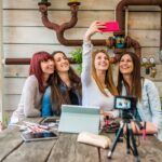 Influencers working in a store creating content for social media together.