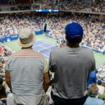 Spectators watching a tennis match at the US Open